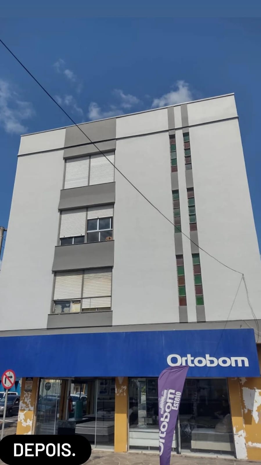 Nova fachada de um prédio onde a Vital Acesso realizou um serviço de pintura.